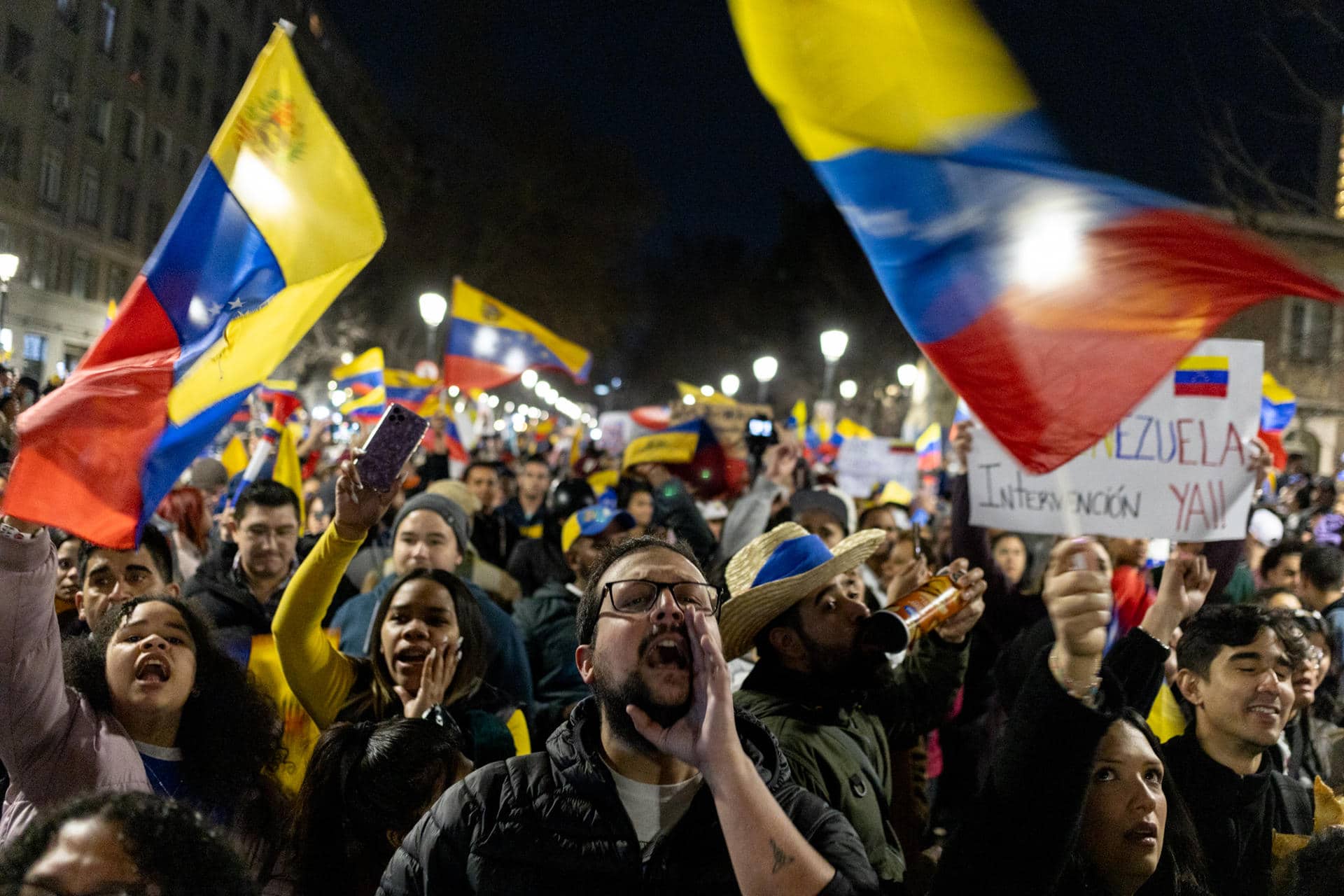 Venezuelans participate in a demonstration